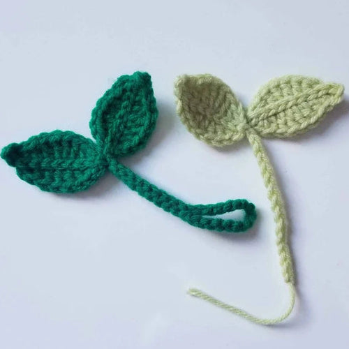 Alternativní popis obrázku (ALT text)
háčkované lístečky na sluchátka kawaii handmade dekorace na sluchátka zelený lístek doplněk